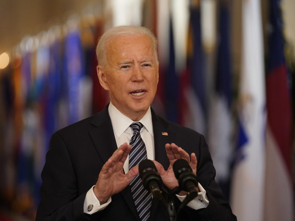 President Biden speaks in the East Room of the White House Thursday night.