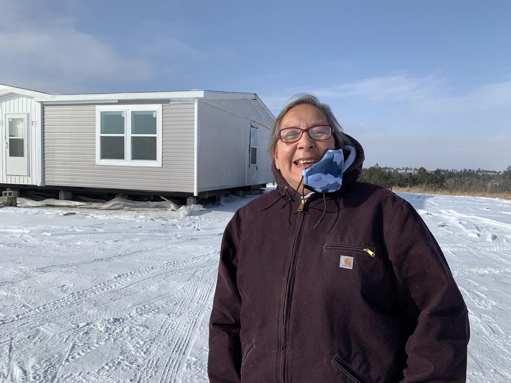 Sharon Swift, a tribal council representative on the Rosebud Reservation, stands in front of what is set to become a new safehouse for homeless teenagers in St. Francis, S.D.