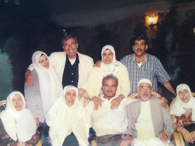 Walid Sakaan (center, bottom) with most of his 11 siblings in Aleppo, Syria, in 2006.