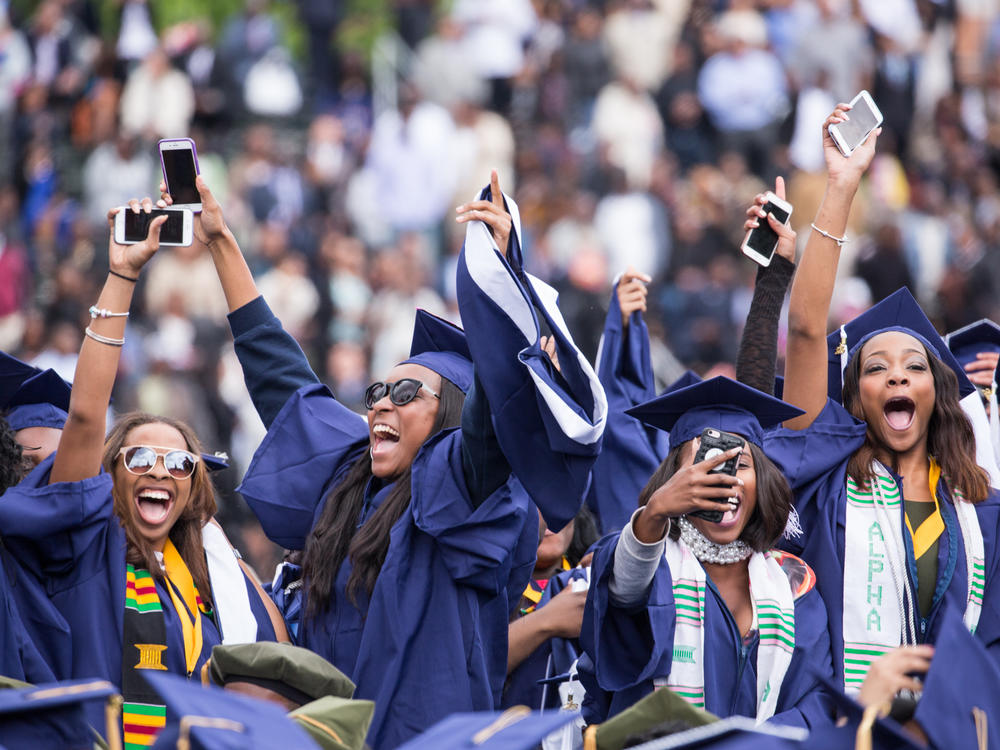 Students celebrate their graduation from Howard University at the end of the 148th Commencement ceremony, at the Upper Quandrangle on campus, on May 7, 2016. Washington, D.C. photojournalist and professor Cheriss May spoke about her photography on <em>The Black Shutter Podcast.</em>