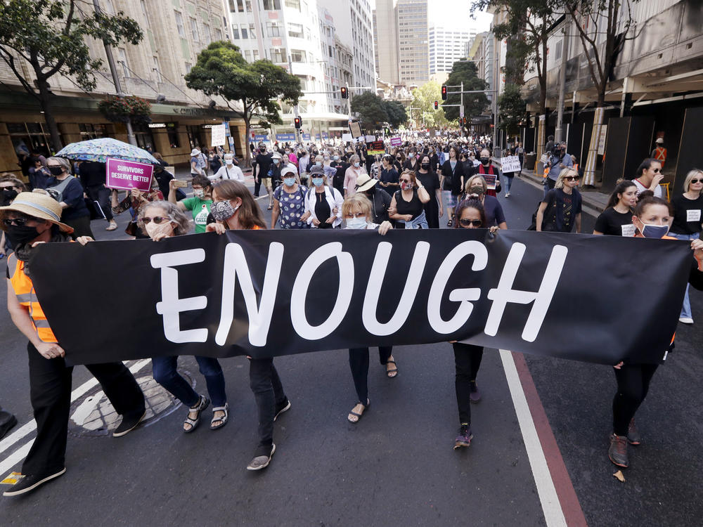 Thousands of people with placards and banners rally in Sydney on Monday, demanding justice for women. The rally was one of several across Australia including in Canberra, Melbourne, Brisbane and Hobart.