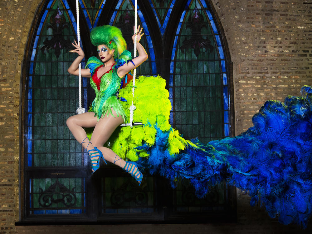 Photographer Adam Ouahmane captured Denali's dramatic train made of feathers inside an old church converted into a circus arts school in Chicago.