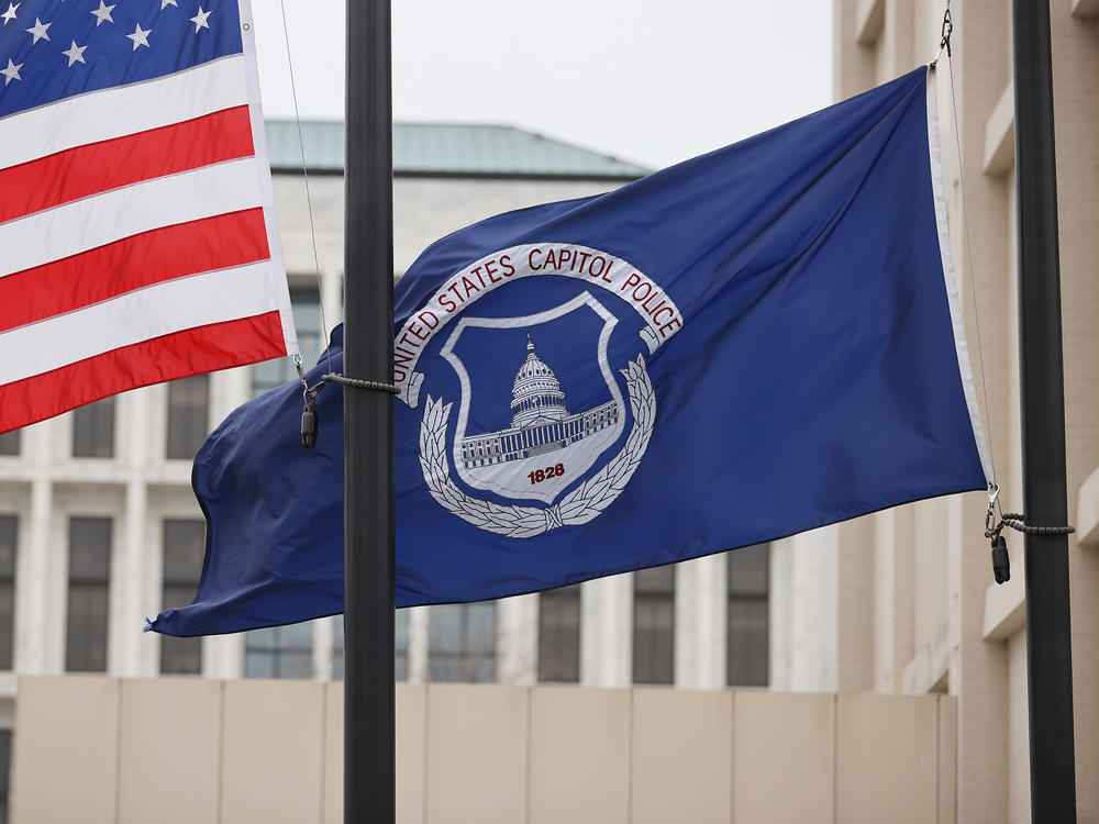 The U.S. flag and the U.S. Capitol Police flag were flown at half-staff after the death of Capitol Police officer Brian Sicknick. On Sunday, the FBI arrested two men who are accused of spraying chemicals on Sicknick and others during the Jan. 6 Capitol riot.