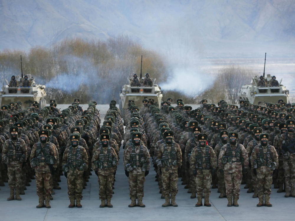 This Jan. 4 photo shows Chinese People's Liberation Army soldiers assembling during military training at Pamir Mountains in Kashgar, northwestern China's Xinjiang region.