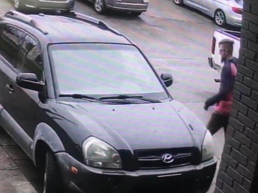 Surveillance camera footage released by the Cherokee County Sheriff's Office appears to show the suspect outside Young's Asian Massage — one of three Atlanta-area spas where people were killed Tuesday.