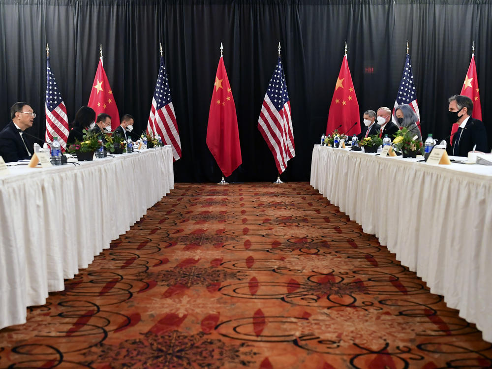 Secretary of State Antony Blinken (second from right), joined by national security adviser Jake Sullivan (right), speaks while facing Chinese Communist Party foreign affairs chief Yang Jiechi (second from left) and China's State Councilor Wang Yi (left) at the opening session of U.S.-China talks at the Captain Cook Hotel in Anchorage, Alaska on Thursday.