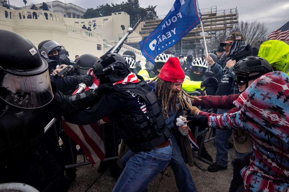 Rioters clash with police during the storming of the Capitol on Jan. 6.