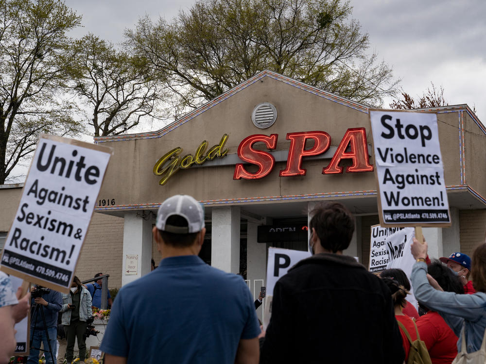 Activists demonstrate outside Gold Spa in Atlanta where a mass shooter killed three women on Tuesday night in a rampage that left eight people dead, including six Asian women.