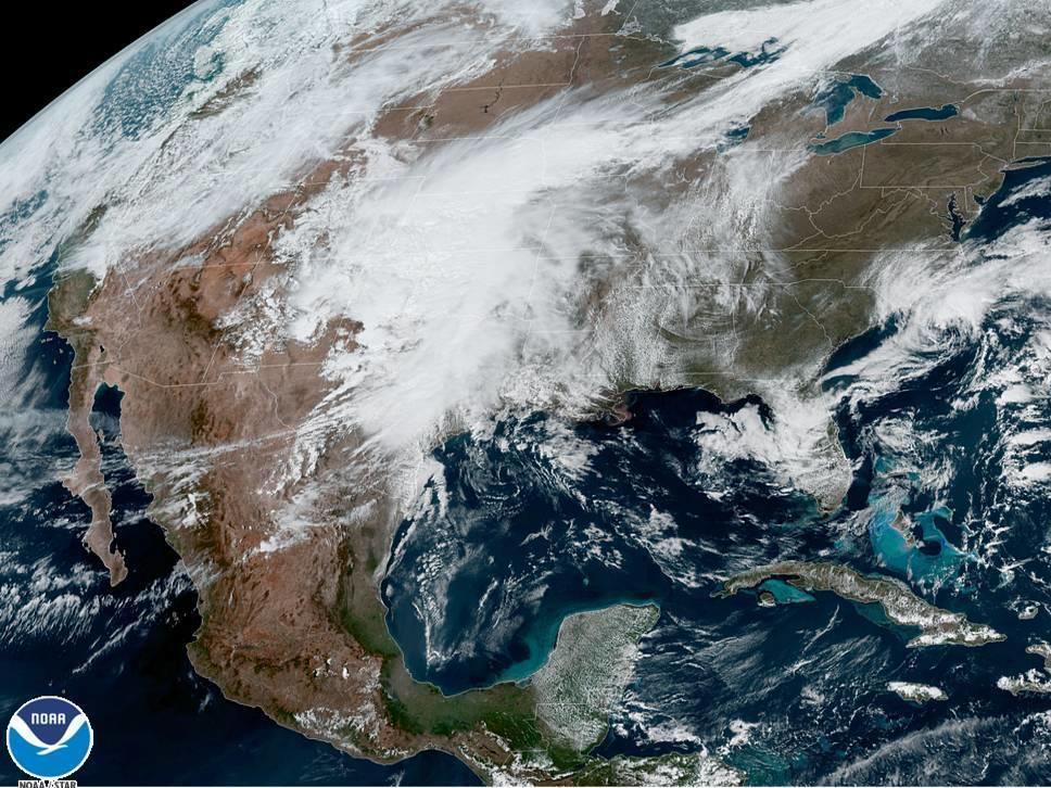 A U.S. satellite captures cloud cover over North America on Monday. The National Oceanic and Atmospheric Administration announced it has upgraded its weather forecasting model to use more satellite weather data.