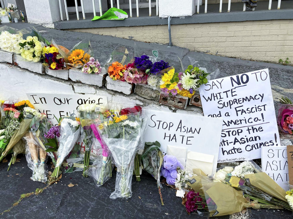 A makeshift memorial is seen on Friday in Atlanta, following the mass shooting of eight people, six of whom were of Asian descent, at three different massage parlors.