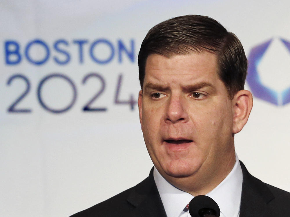 Then-Boston Mayor Martin Walsh speaks during a news conference in Boston on Jan. 9, 2015, promoting the city's bid to host the 2024 Olympic Summer Games. Walsh led the city over two terms.
