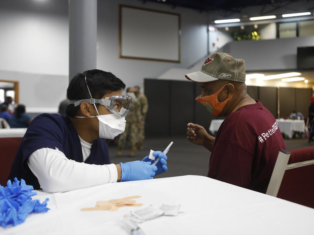 Florida's Pasco County Health Department and the Army National Guard partnered with Fellowship Church in Tampa, Fla., to help city residents age 65 and older get immunized with the Moderna COVID-19 vaccine in February.