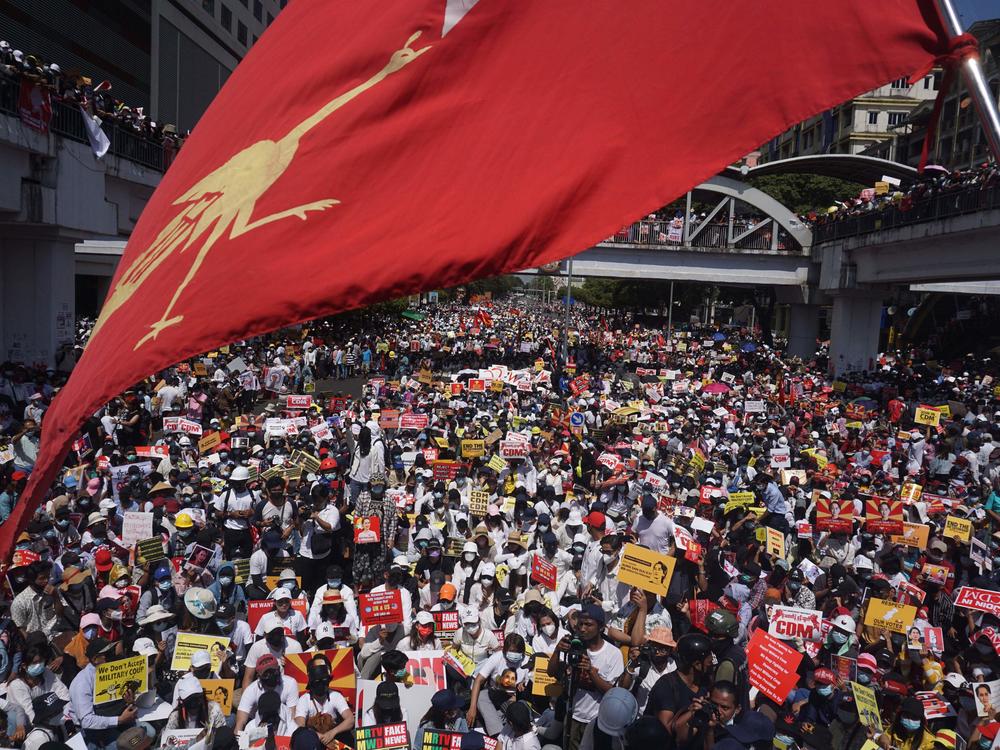 Protesters block a major road during a demonstration against the military coup in Yangon on Feb. 17.