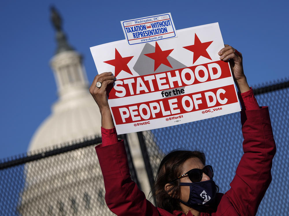 Residents of the District of Columbia rally for statehood Monday near the U.S. Capitol ahead of a House committee hearing on the effort.