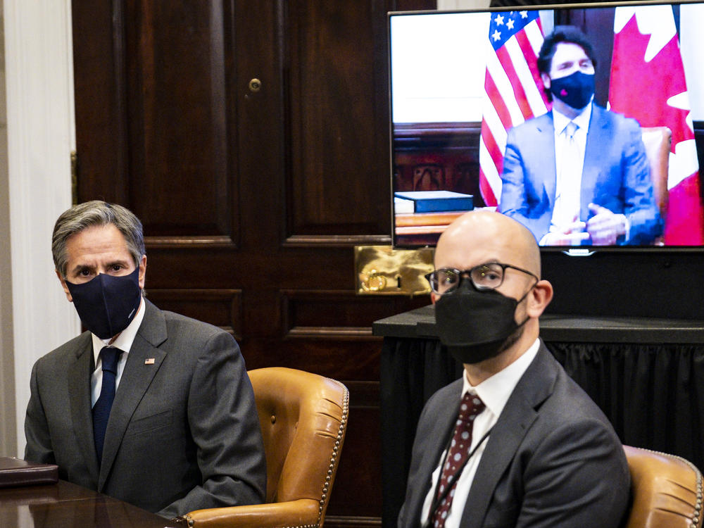 Juan Gonzalez (right), the National Security Council's senior director for the Western Hemisphere, joins Secretary of State Antony Blinken in a virtual meeting with Canadian Prime Minister Justin Trudeau in February.