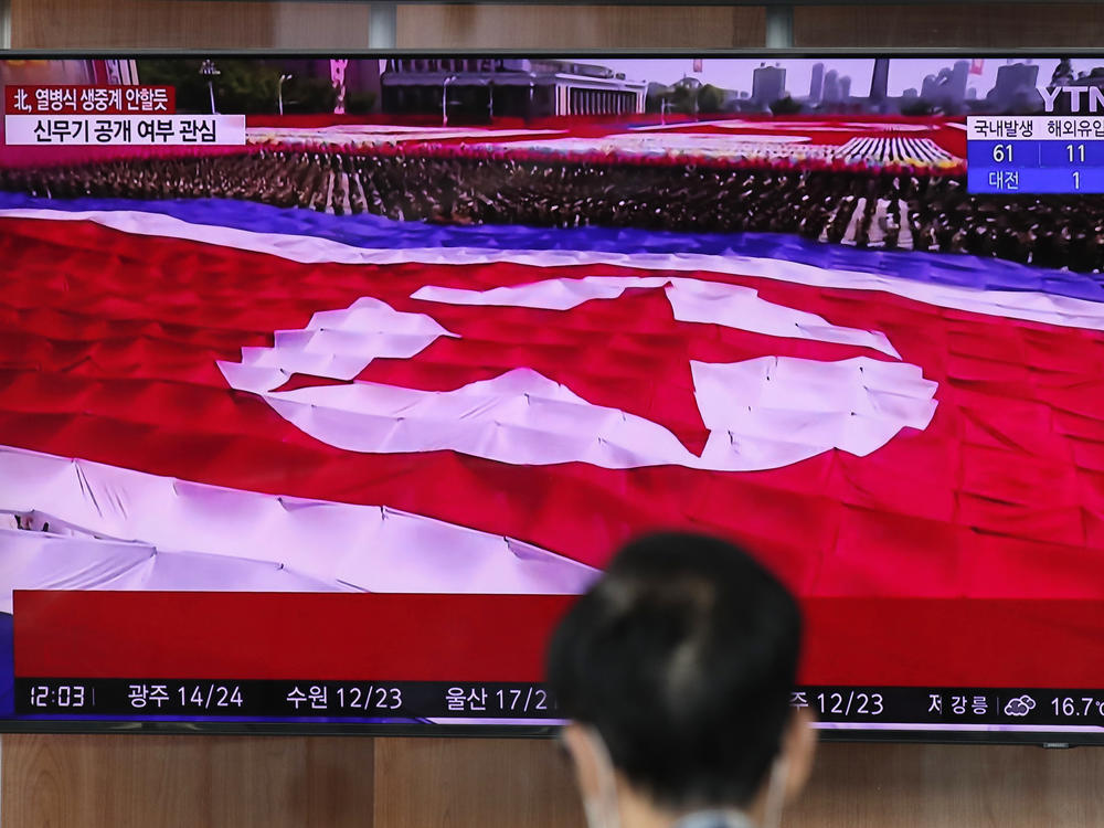 North Korea's flag is seen on a TV screen during a South Korean news program in this file photo from Oct. 10, 2020.