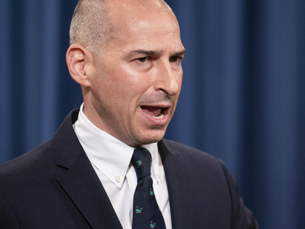 Then-acting U.S. Attorney Michael Sherwin speaks during a news conference on Jan. 12. After an interview Sherwin gave about the ongoing Capitol insurrection investigation, a federal judge criticized the Justice Department with a potential gag order.