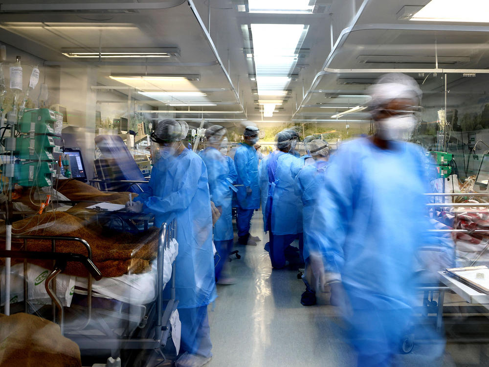 Health workers care for COVID-19 patients in the emergency room of a hospital in Porto Alegre, Brazil, on March 11. In more than half of Brazil's 26 states, ICU occupancy rates have hit 90% or above during the pandemic.