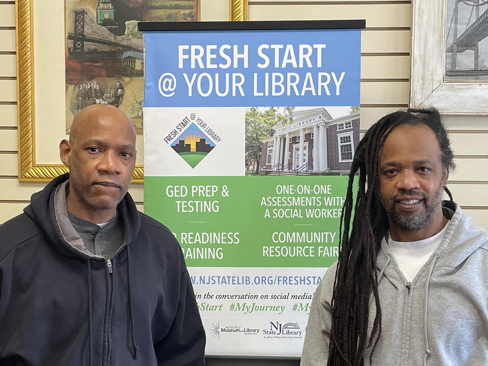 Brothers Dennis (left) and Lee Horton were recently released from prison. The New Jersey Public Library's Fresh Start program has helped them navigate daily life and learn new technology that didn't exist in 1993.