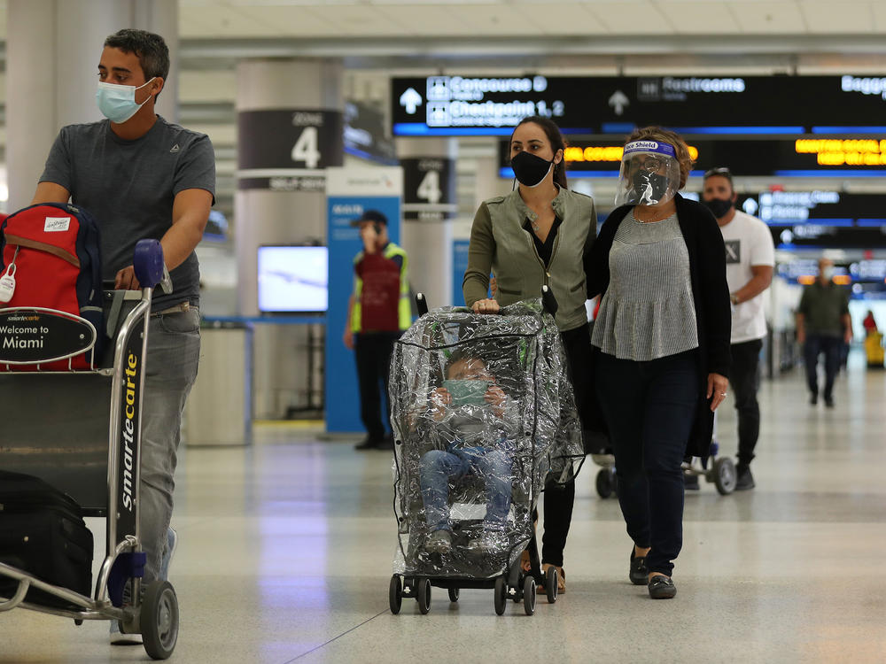 With precautions such as mask-wearing in place, experts predict travel is among the activities that may become safer by this summer.