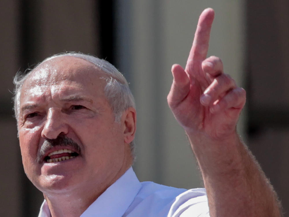 Belarus' President Alexander Lukashenko delivers a speech during a rally held to support him in central Minsk, on Aug. 16.