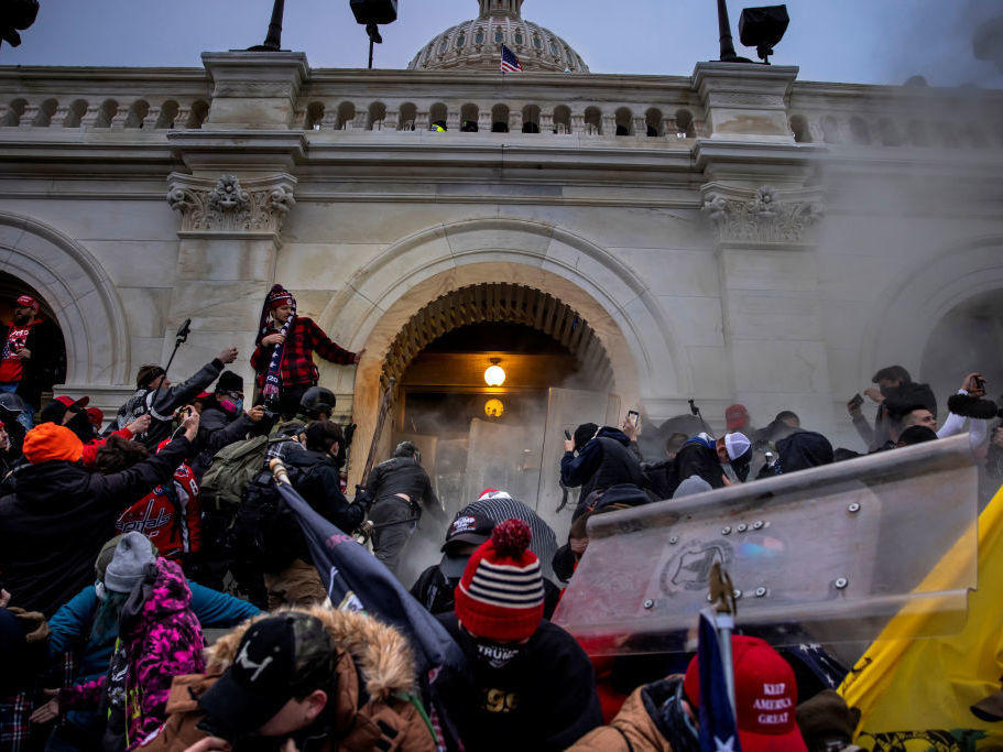 Trump supporters clash with police and security forces as people try to storm the U.S. Capitol on Jan. 6.