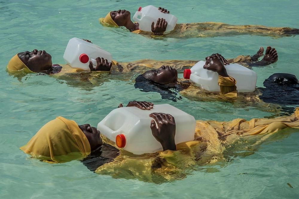 Kijini Primary School students learn to float, swim and perform rescues on Oct. 25, 2016, in the Indian Ocean at Muyuni, Zanzibar. 