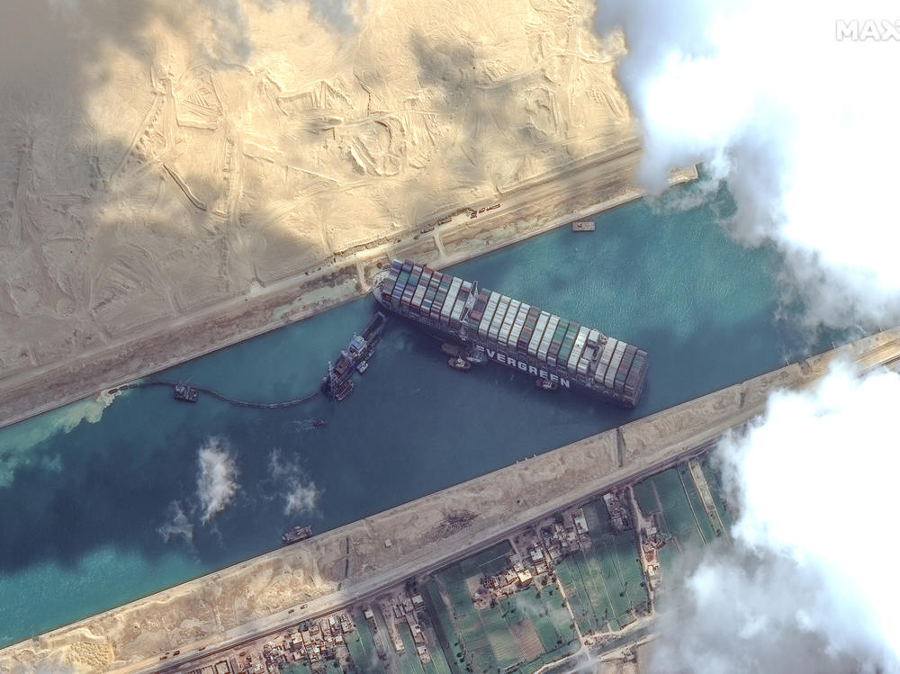 High-resolution satellite imagery shows the Suez Canal and the container ship Ever Given that was finally freed on Monday.