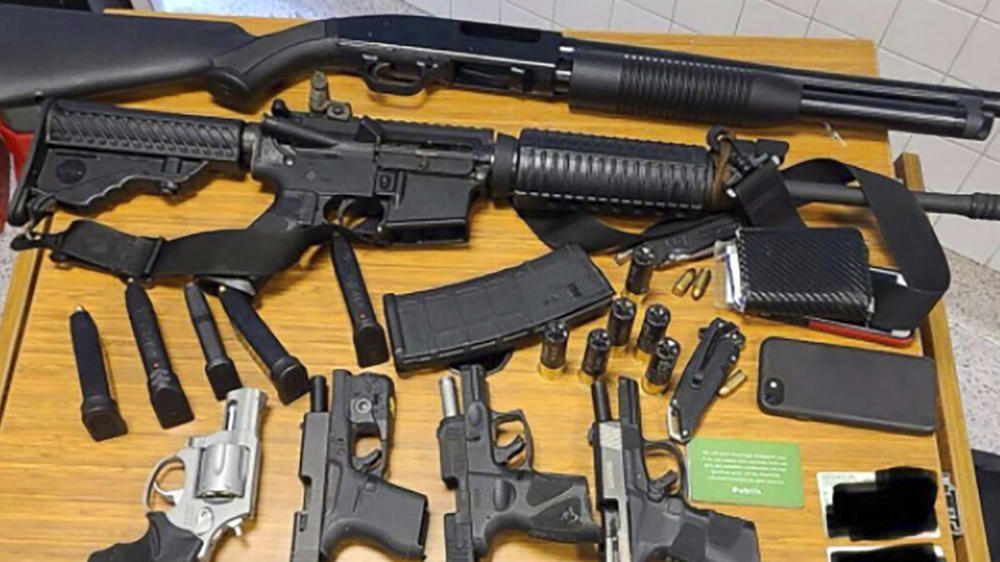This photo provided by the Atlanta Police Department shows weapons that Rico Marley was armed with at the time of his arrest on Wednesday.