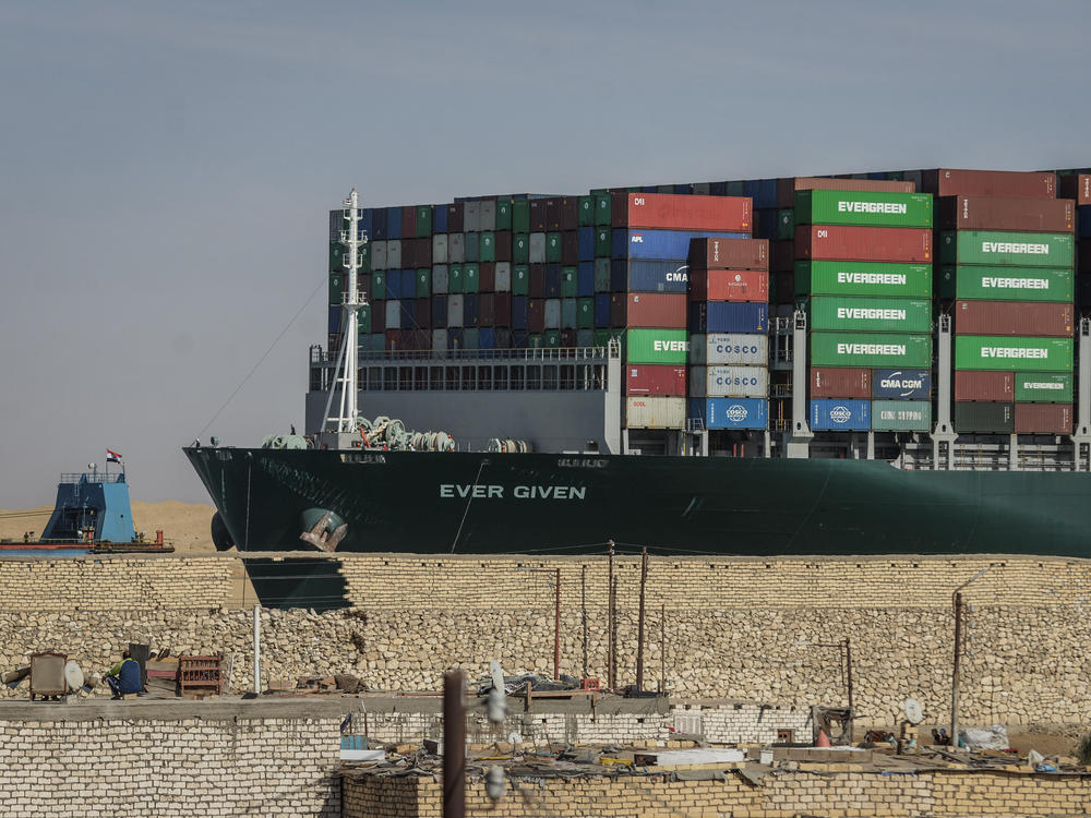 The Ever Given container ship, operated by the Evergreen Marine Corp., sails through the Suez Canal after it was fully freed and floated on Friday.