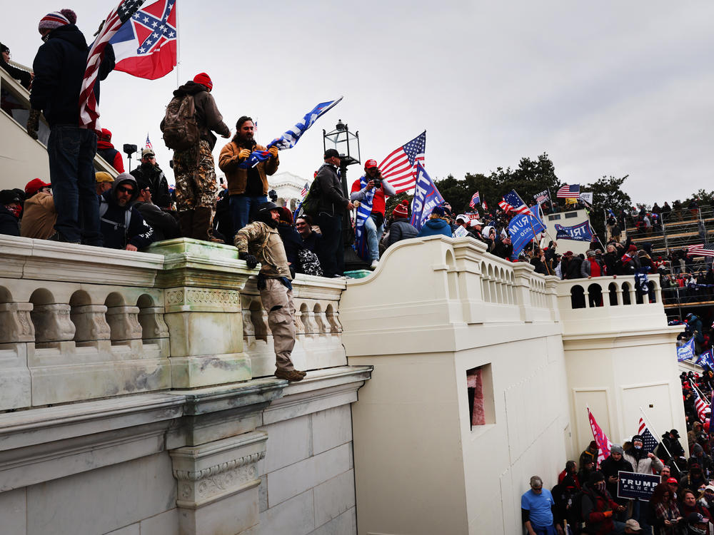 Thousands of supporters of former President Donald Trump storm the U.S. Capitol following a 