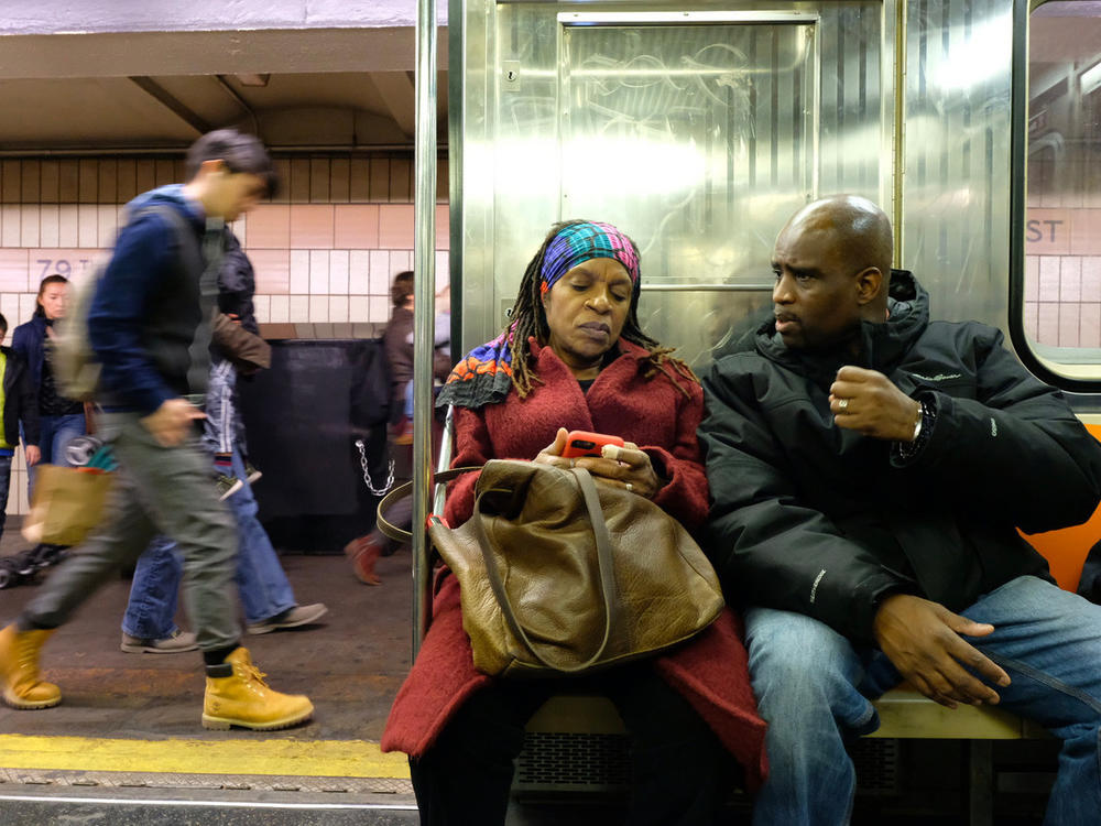 Sheila Rule and Joe Robinson take the subway to a Riverside Church Prison Ministry meeting in Manhattan on Nov. 20, 2016. Rule and Robinson, married for almost 12 years while Joe was still incarcerated, are here together for the first time since he was released from a 25-year prison sentence for killing a man.