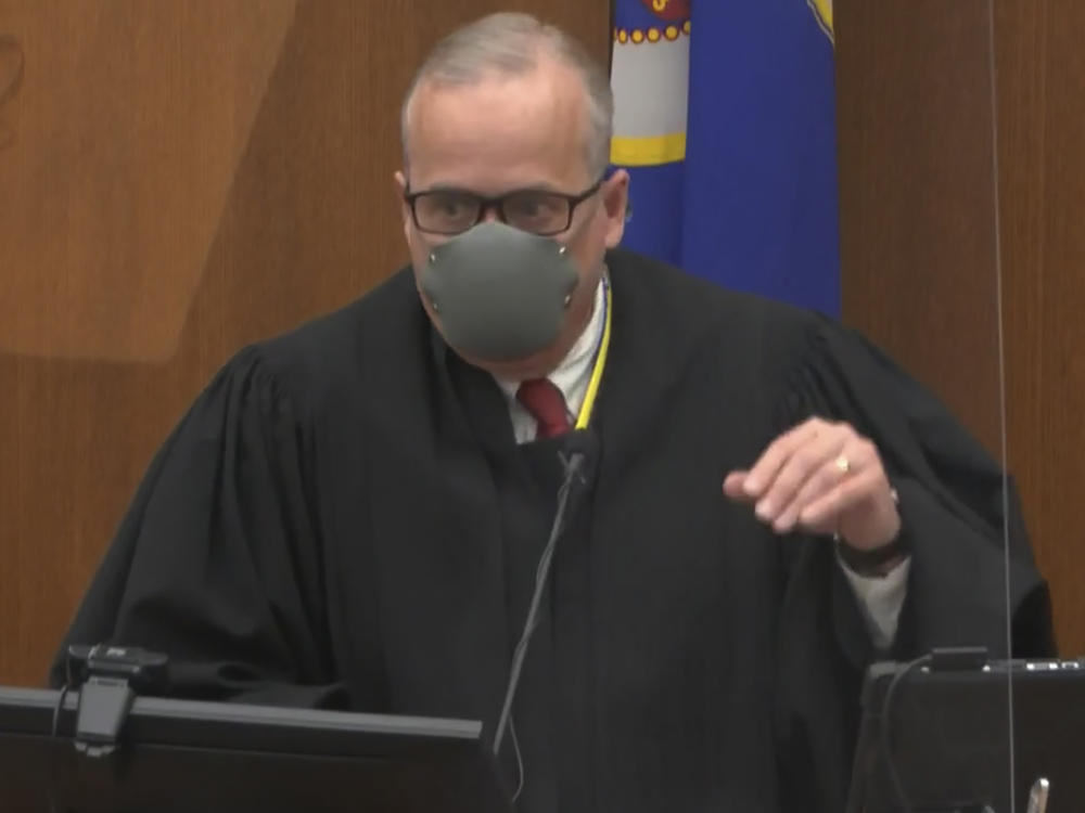 In this image from video, Hennepin County Judge Peter Cahill discusses motions before the court on Tuesday in the trial of former Minneapolis police officer Derek Chauvin at the Hennepin County Courthouse in Minneapolis.