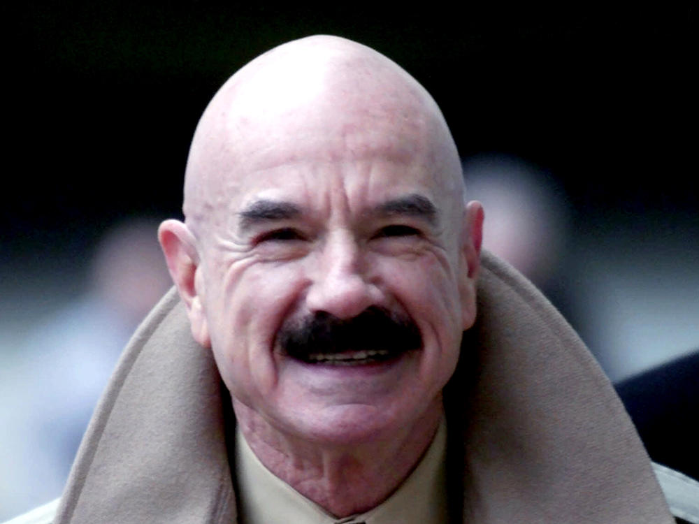 G. Gordon Liddy, pictured in 2001, died on Tuesday at the age of 90. He was convicted for orchestrating the Watergate burglary and wiretapping scheme that led to President Nixon's disgraced resignation.