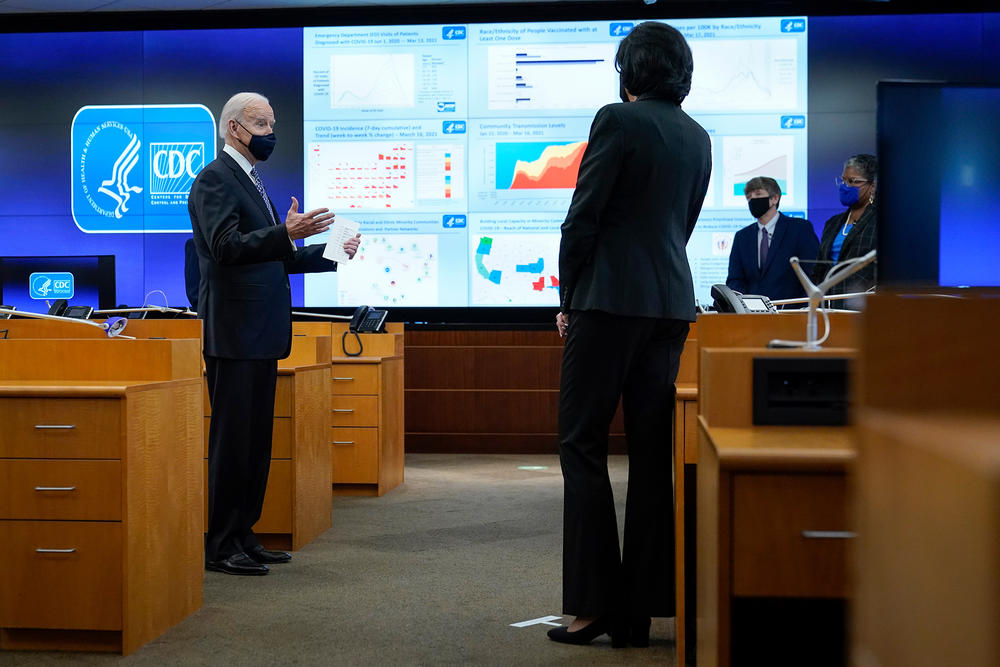 President Joe Biden speaks during a COVID-19 briefing at CDC headquarters in Atlanta, along with Dr. Rochelle Walensky. The administration has backed up public health guidance from the agency.