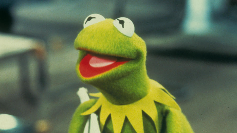 Seen here in <em>The Muppets Take Manhattan</em>, Kermit the Frog has been in a class of his own since many of us were itty bitty babies. Maybe even longer.