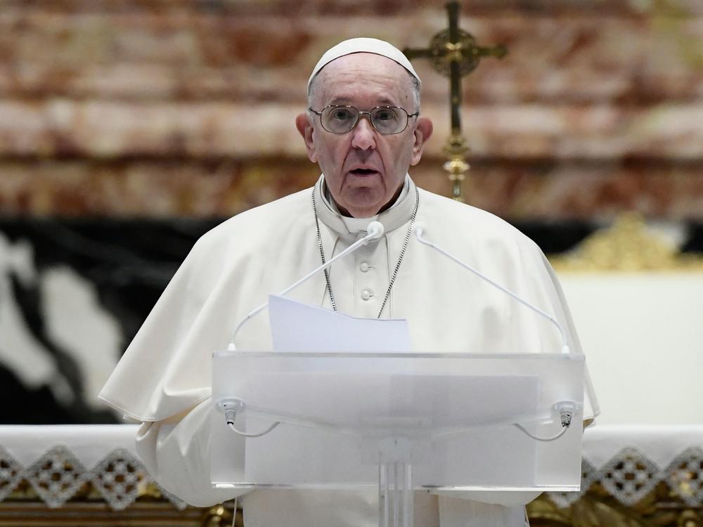 Pope Francis speaks prior to delivering his Urbi et Orbi blessing after celebrating Easter Mass on Sunday at St. Peter's Basilica in the Vatican.