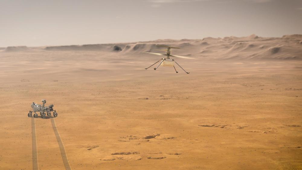When NASA's Ingenuity Mars Helicopter attempts its first test flight on the Red Planet, the agency's Mars 2020 Perseverance rover will be close by, as seen in this artist's concept.
