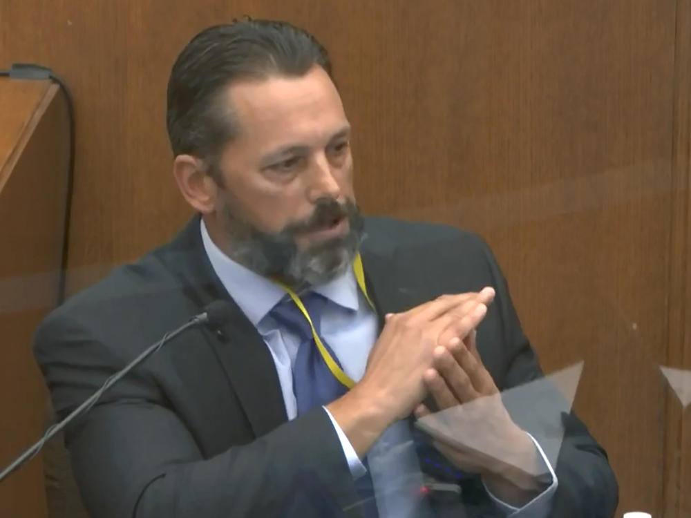 Minneapolis Police Lt. Johnny Mercil testifies Tuesday in the trial of former officer Derek Chauvin. Mercil told jurors that the technique Chauvin used to restrain George Floyd was not taught by the police.