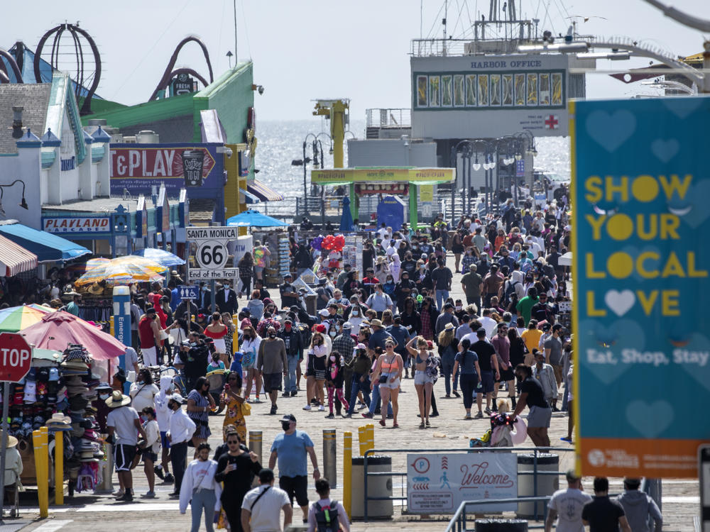 The Santa Monica Pier welcomed outdoor visitors on Monday as Los Angeles County entered the less-restrictive orange tier. The following day, California Gov. Gavin Newsom announced a target statewide reopening date of June 15, provided certain public health criteria are met.