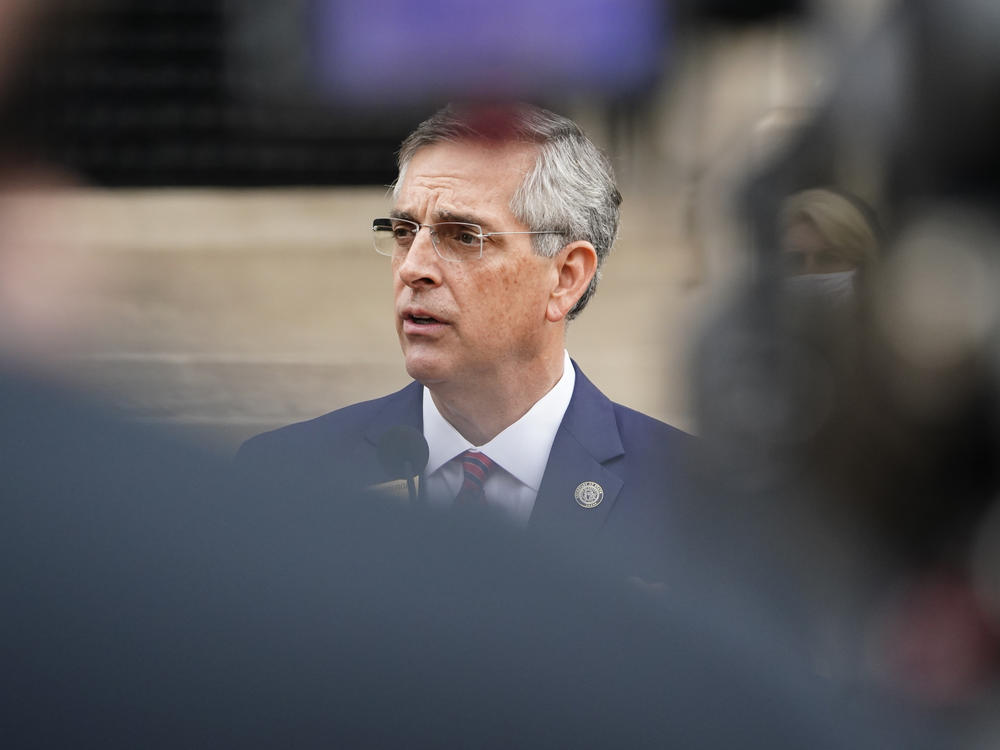 Georgia Secretary of State Brad Raffensperger won wide praise for firmly rejecting former President Donald Trump's false claims of voter fraud. But now that those claims have spawned tighter voting measures, the Republican state official is taking a softer approach.