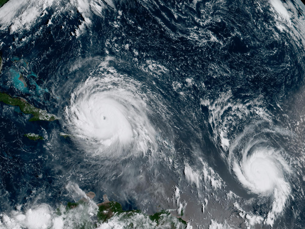 A satellite image from September 2017 shows Hurricane Irma, left, and Hurricane Jose, right, in the Atlantic Ocean. NOAA says the average annual number of tropical storms in the Atlantic has slightly increased.
