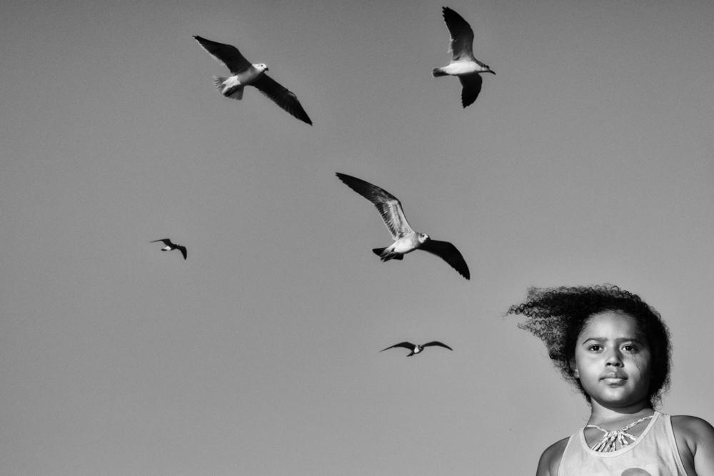 Elena, age 9, lives in Harlem with her mother and grandmother. Zusman made Brighton Beach the backdrop of her project: photographing kids of color and then taking note of how they reacted to their photos. The idea was to give the children the chance to respond and make the work more collaborative, 