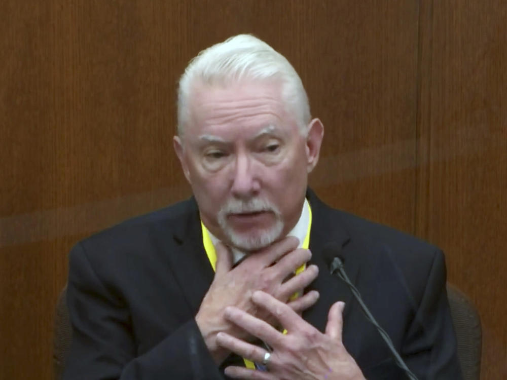 Barry Brodd, a use-of-force expert, testifies Tuesday in former Minneapolis police officer Derek Chauvin's trial. Brodd said the position in which George Floyd was restrained — facedown on the ground — was safest for officers and the suspect.