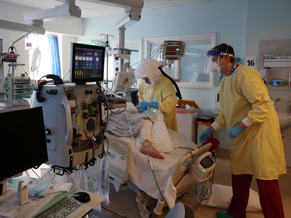 Hospital workers tend to a Covid-19 patient at Queen Alexandra Hospital in Portsmouth, England, last month. Researchers have found that the so-called U.K. variant of the coronavirus isn't more likely to lead to death or severe illness.