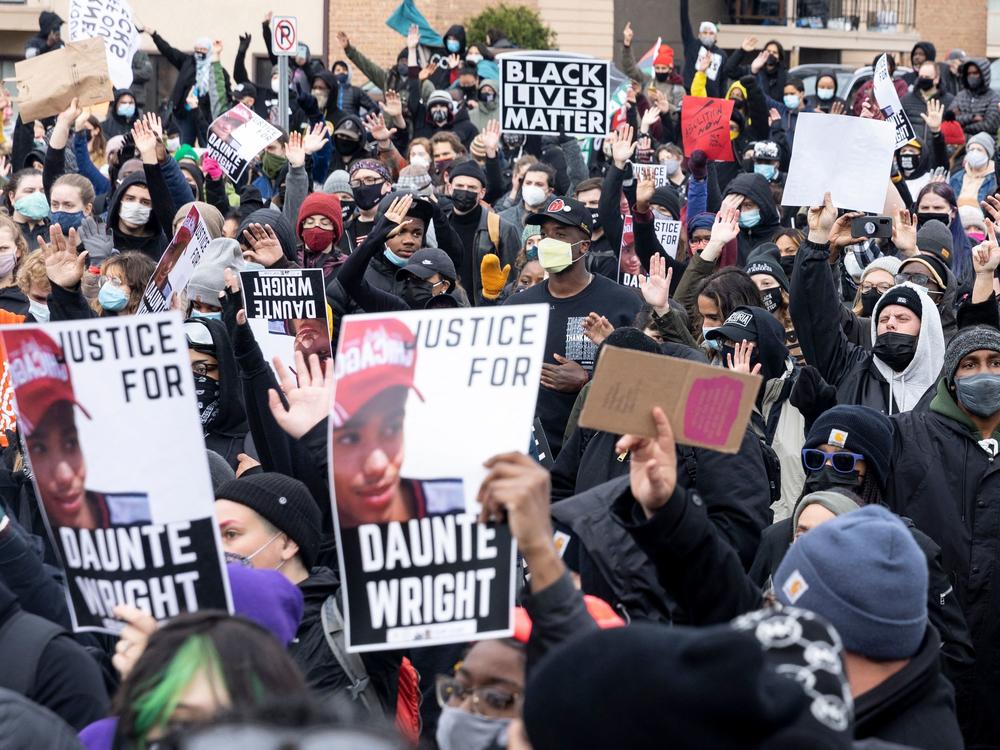 Hundreds gathered before the 7 p.m. curfew outside the Brooklyn Center police station to mourn and protest the death of 20-year-old Black man Daunte Wright.