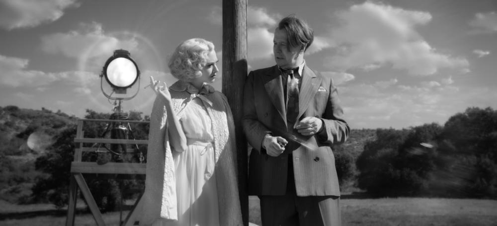 Amanda Seyfried as Marion Davies and Gary Oldman as Herman Mankiewicz in <em>Mank.</em>