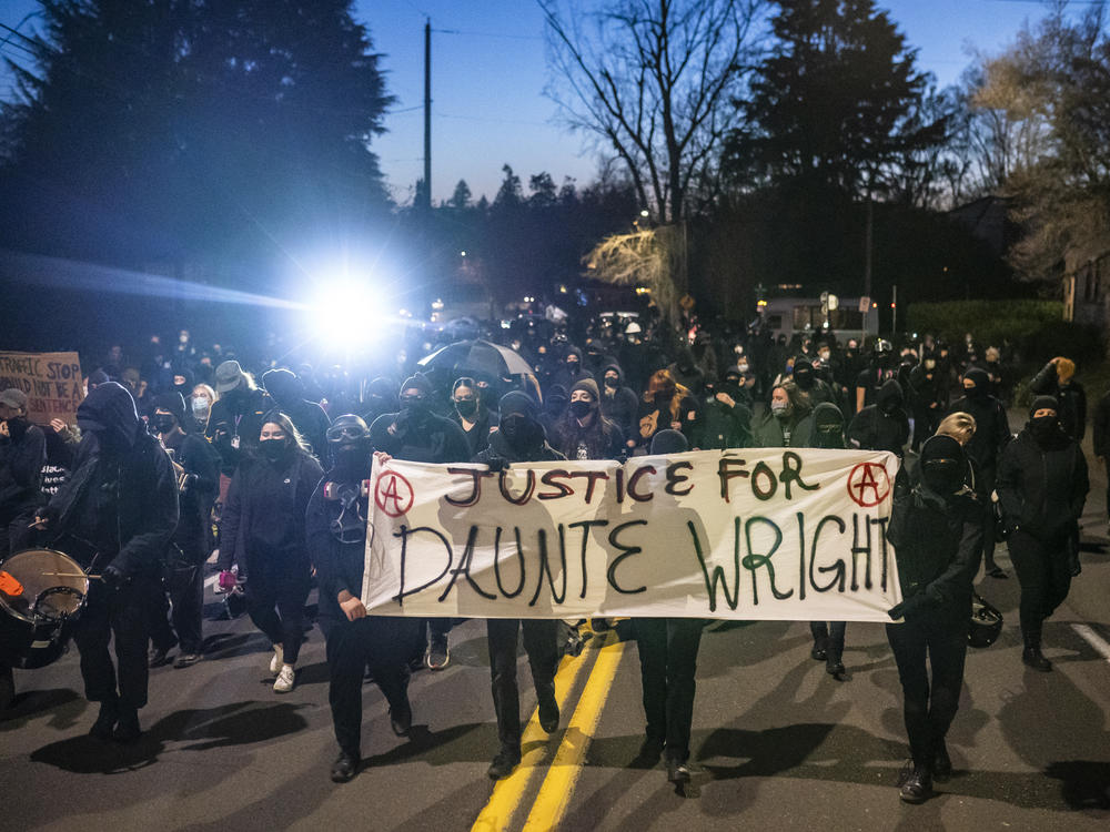Activists in Portland marched towards the Multnomah County Sheriff's office Monday night. Later, Portland police declared a riot at another location.