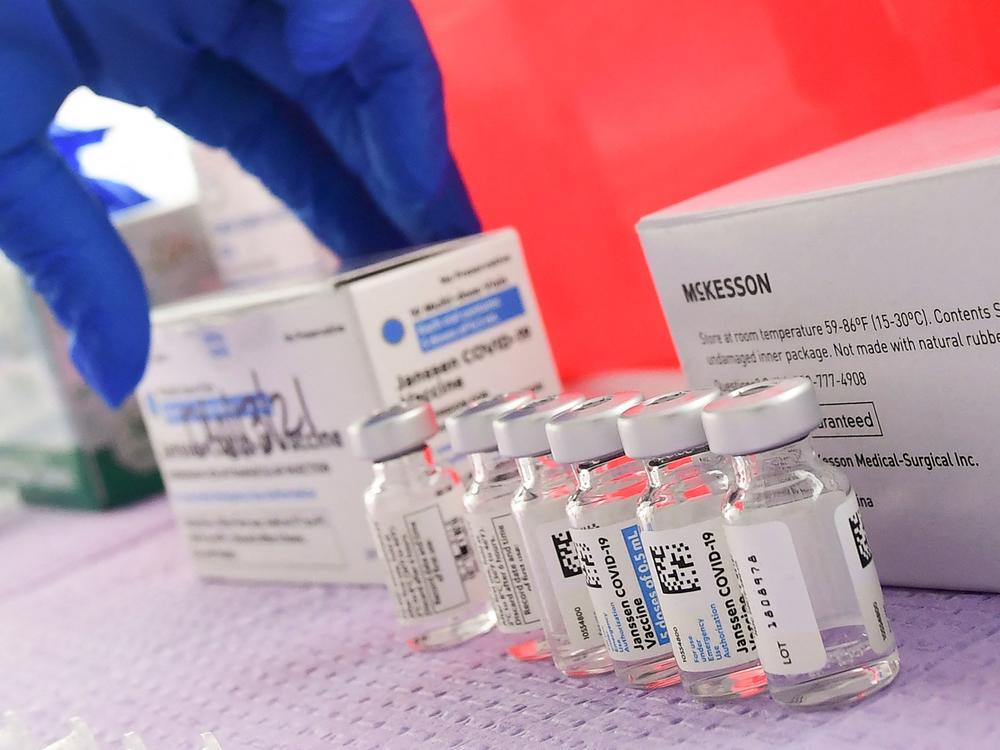 Bottles of the single-dose Johnson & Johnson Janssen COVID-19 vaccine await transfer into syringes for administering in March in Los Angeles. The CDC had called on Tuesday for a pause in administering the vaccine.