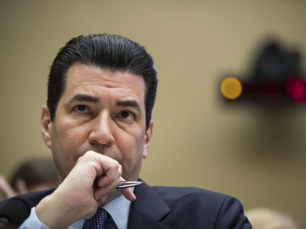 Dr. Scott Gottlieb, then commissioner of the Food and Drug Administration, testifies during a House hearing on in October 2017. In an NPR interview, Gottlieb says he doesn't expect enough demand for the COVID-19 vaccine much beyond 160 million Americans.